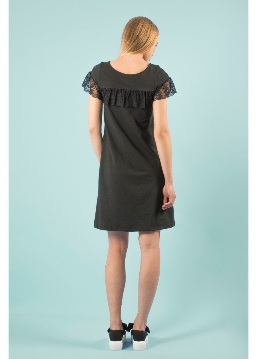 Robe noire en coton bio à volant dentelle. Coupe chasuble mi-longue aux genoux. Mode éco-friendly vegan et fabriqué en France
