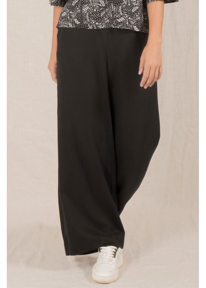 Pantalon fluide taille haute noir et ample en tencel est fabriqué en France. Marque vegan éthique française éco-responsable